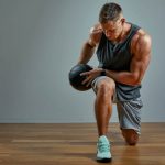 man working out with medicine ball
